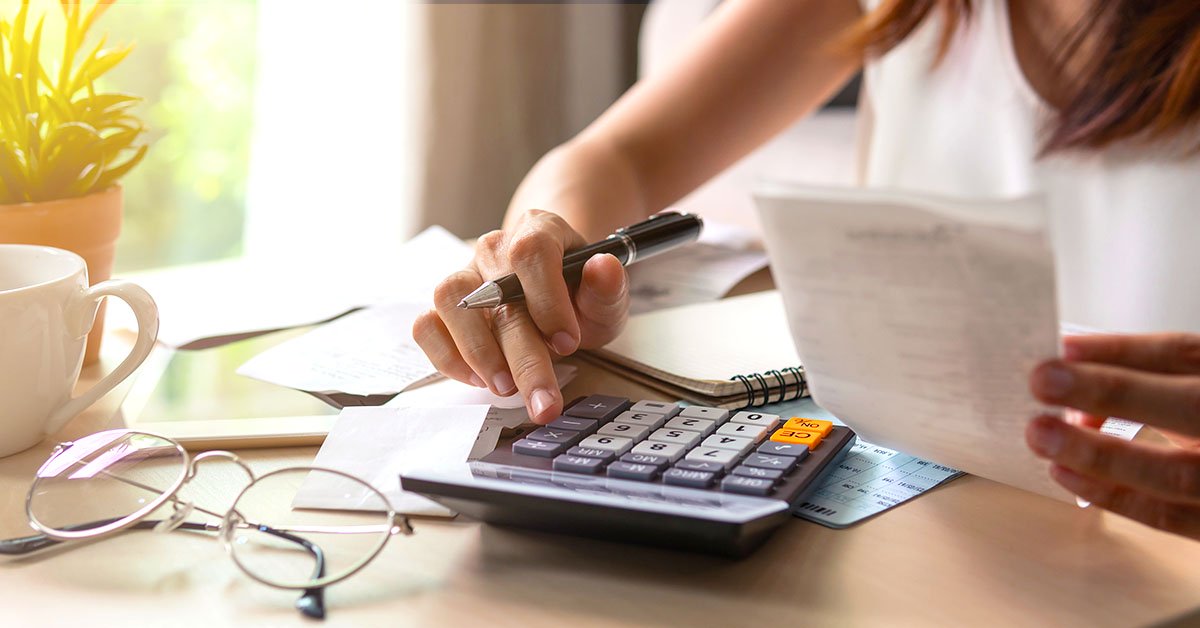 woman calculating financial