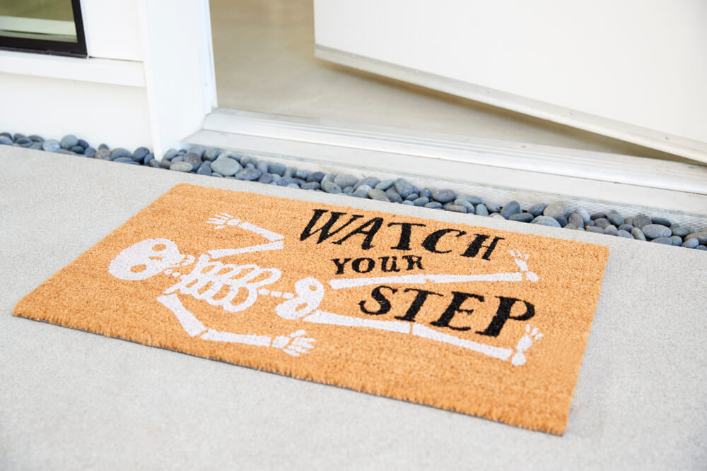 5-creative-front-door-designs-great-first-impression-your-home-ohmyhome-make-your-welcome-mat-a-statement-piece