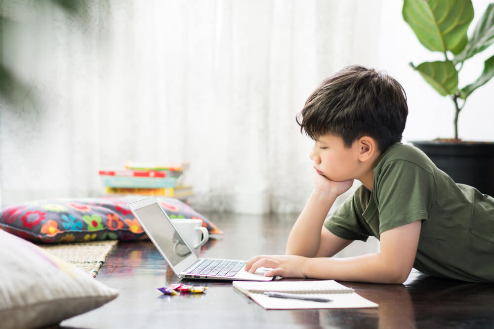 what-you-need-know-about-home-based-learning-boy-laptop