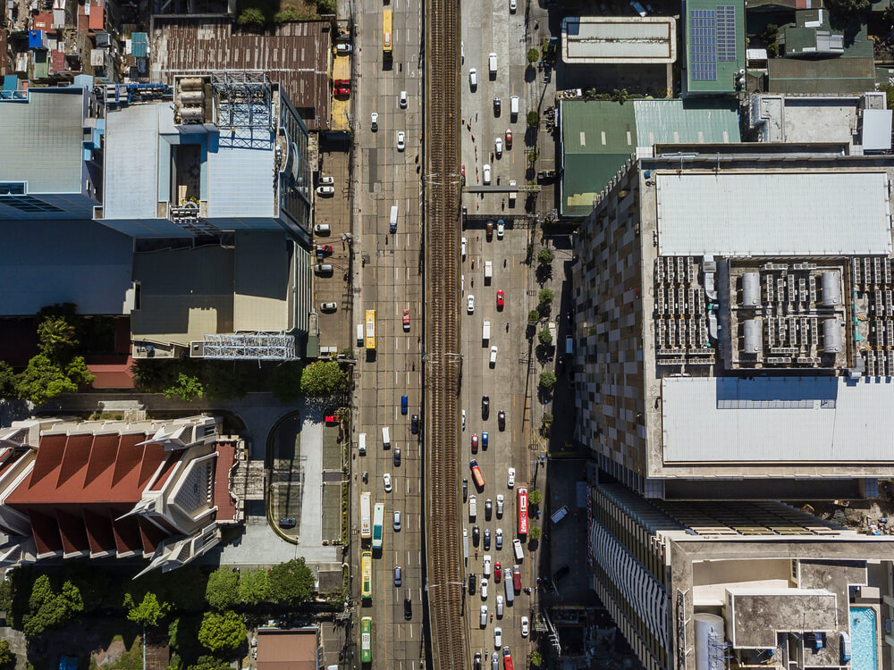 ecq-mecq-gcq-mgcq-whats-difference-philippines-street-vehicles-aerial-view